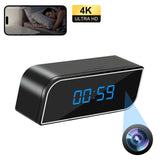 Mini WiFi pinhole spy camera disguised as an alarm clock, displaying time and streaming 4K video.