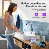 Woman using sink with motion detection system, highlighting real-time alerts and convenience.