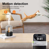 WiFi hidden camera diffuser with motion detection alert; features a cat jumping in a cozy living room setting.
