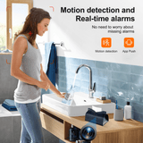 Woman using bathroom sink with motion detection camera for real-time alerts and app notifications.